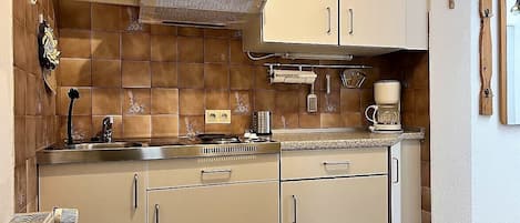 Fridge, microwave, coffee/tea maker, toaster