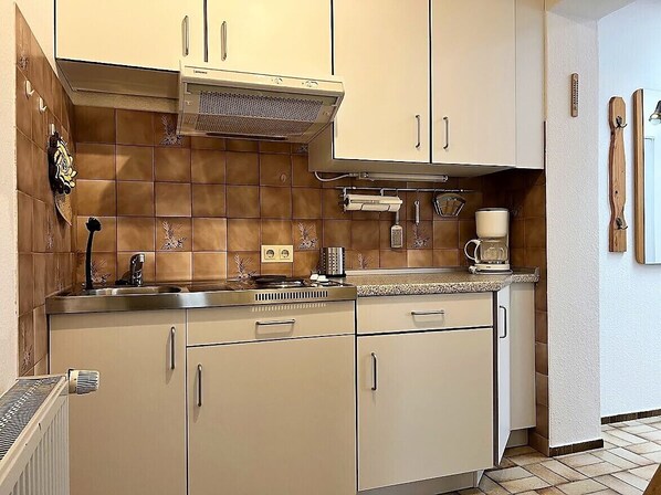 Fridge, microwave, coffee/tea maker, toaster