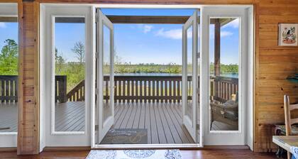 Beautiful log cabin w/ private dock, gameroom, 23mi to beach, 3bd2ba, sleeps 11