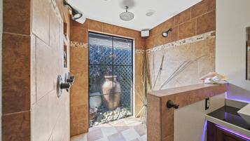 Bathtub, towels, toilet paper