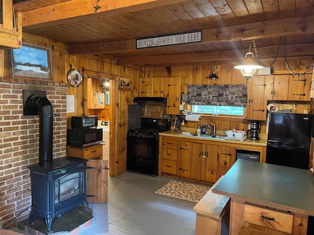 Fridge, microwave, oven, stovetop. 2 bedroom private custom built home with loft.