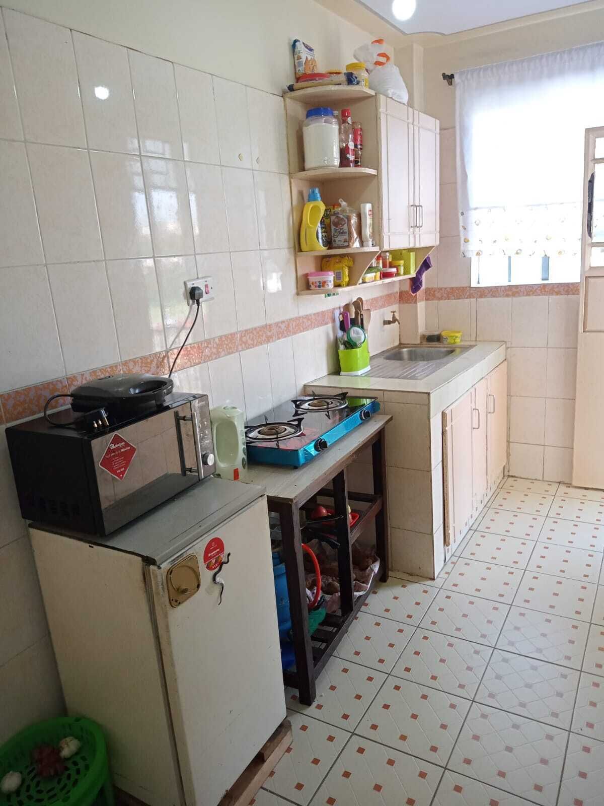 Fridge, electric kettle, cookware/dishes/utensils