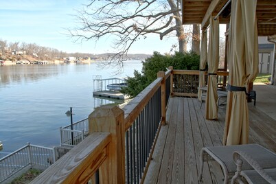 Peaceful home with amazing outdoor spaces inside a cove!  Sleeps 12, 3 King beds