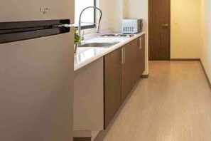 Fridge, microwave, cookware/dishes/utensils