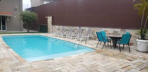 Outdoor pool, a heated pool - High Standard House with Heated Pool and Sauna (Bertioga)