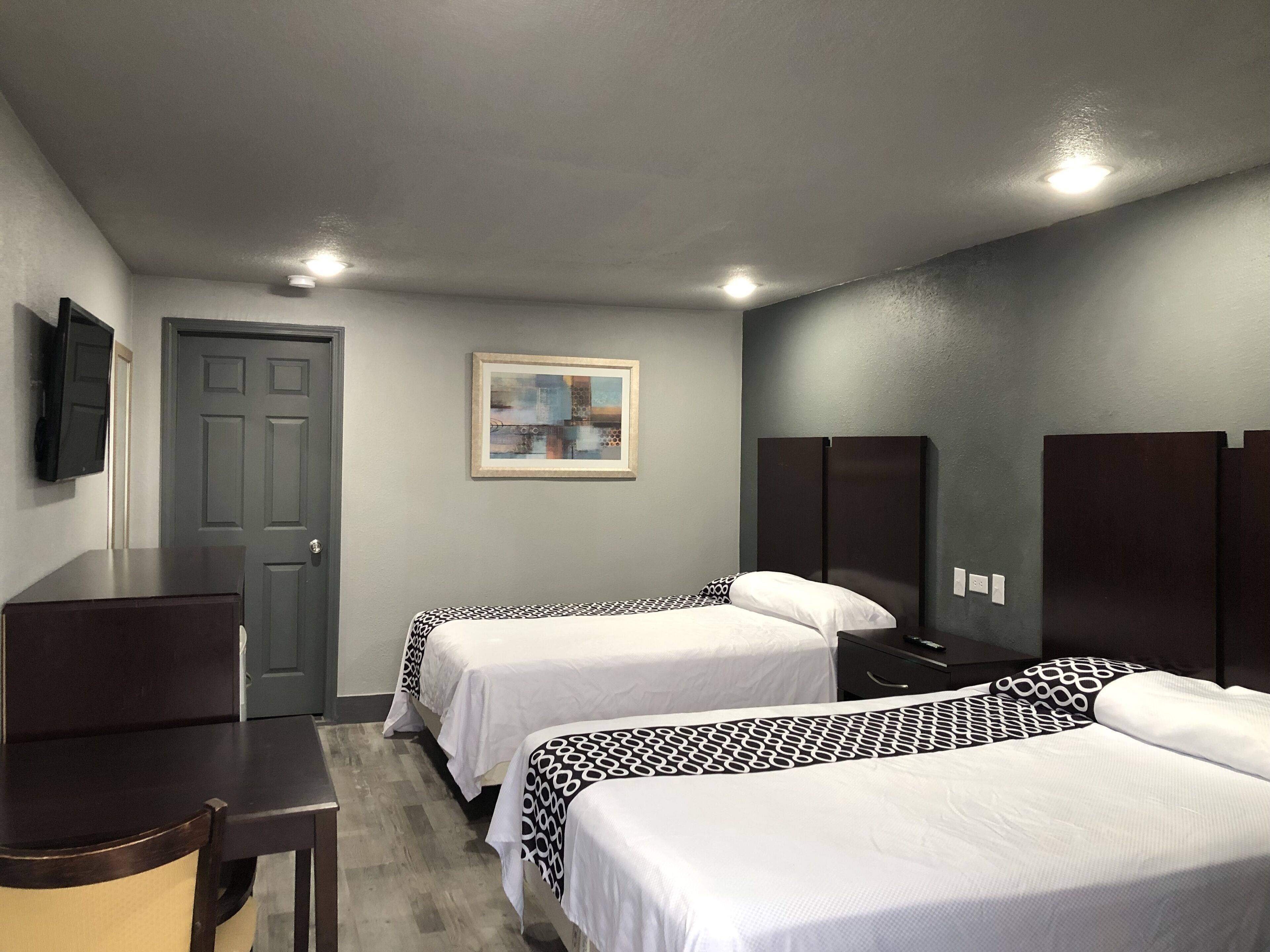 Desk, laptop workspace, free WiFi, bed sheets