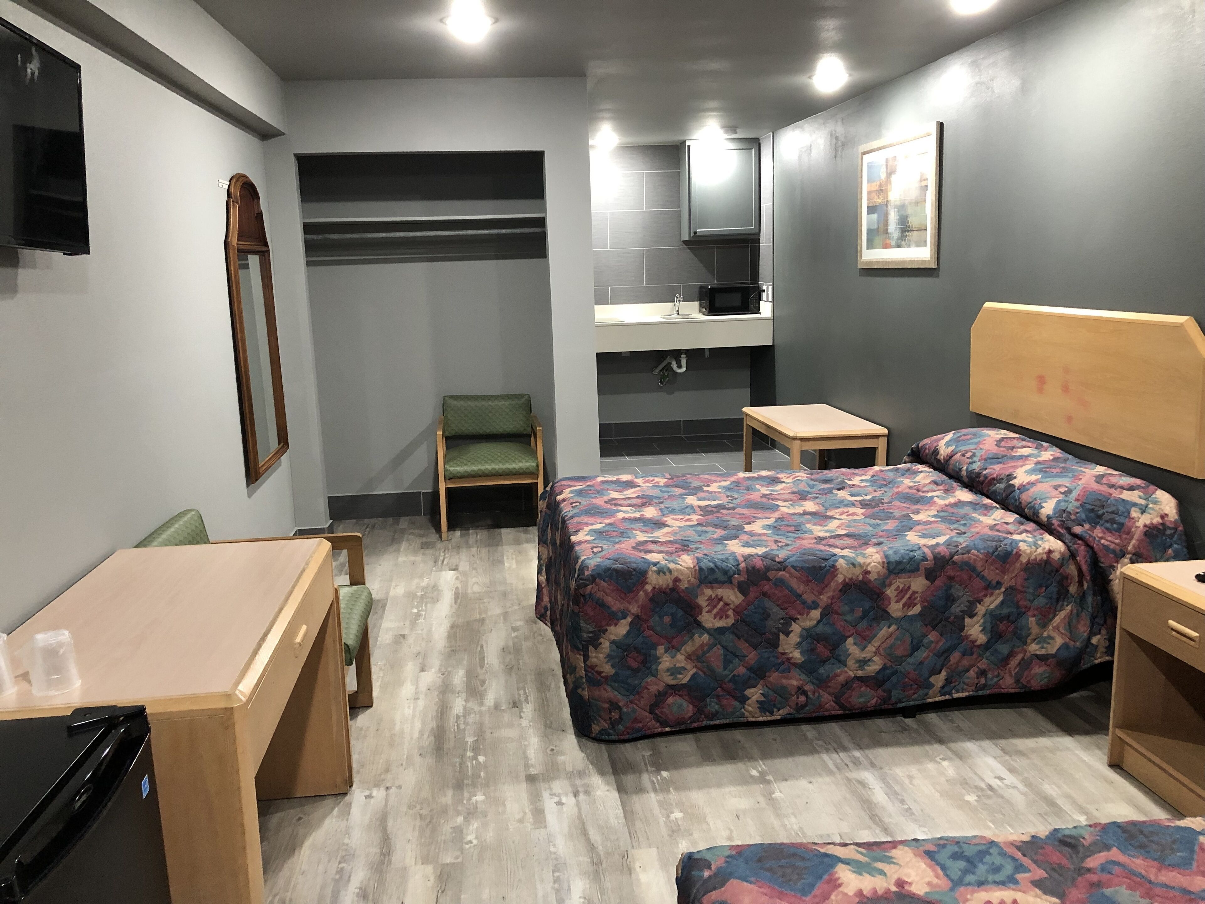 Desk, laptop workspace, free WiFi, bed sheets