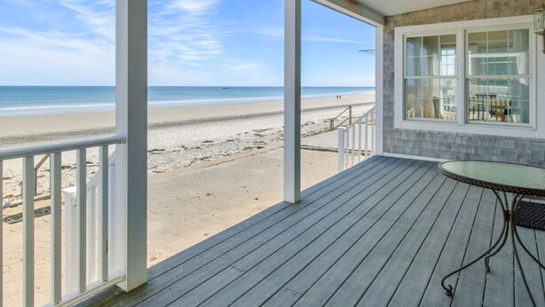 A covered deck with a view of the beach. - STUNNING BEACHSIDE HOME-WELLS BEACH: 180 DEGREE OCEAN VIEWS: 9-1 to 9-3 open (Wells)