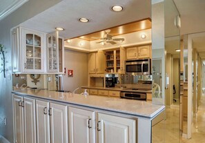 Fridge, microwave, coffee/tea maker, electric kettle