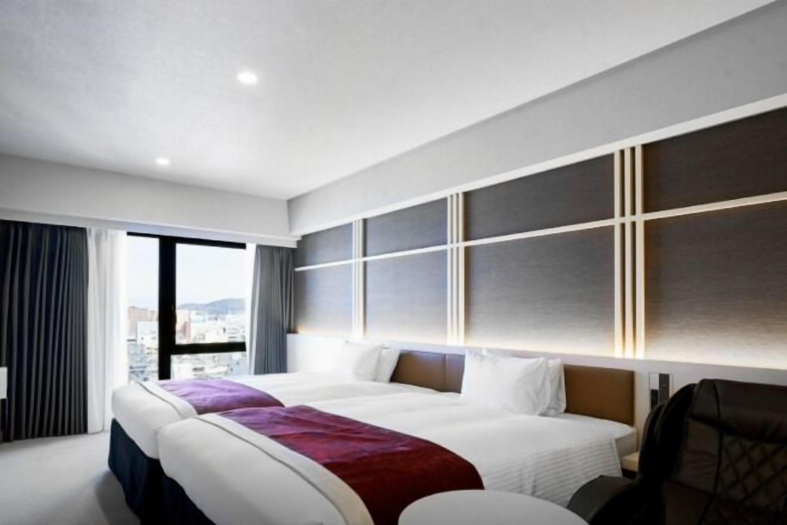 Een kluis op de kamer, verduisterende gordijnen, gratis wifi, beddengoed