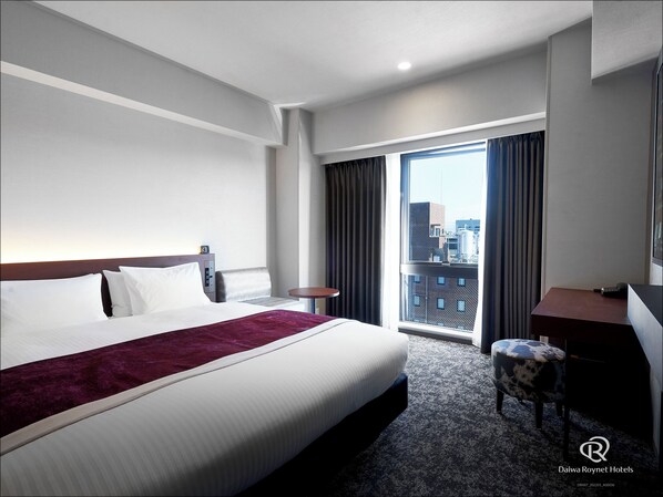 Zimmersafe, Verdunkelungsvorhänge, kostenloses WLAN, Bettwäsche