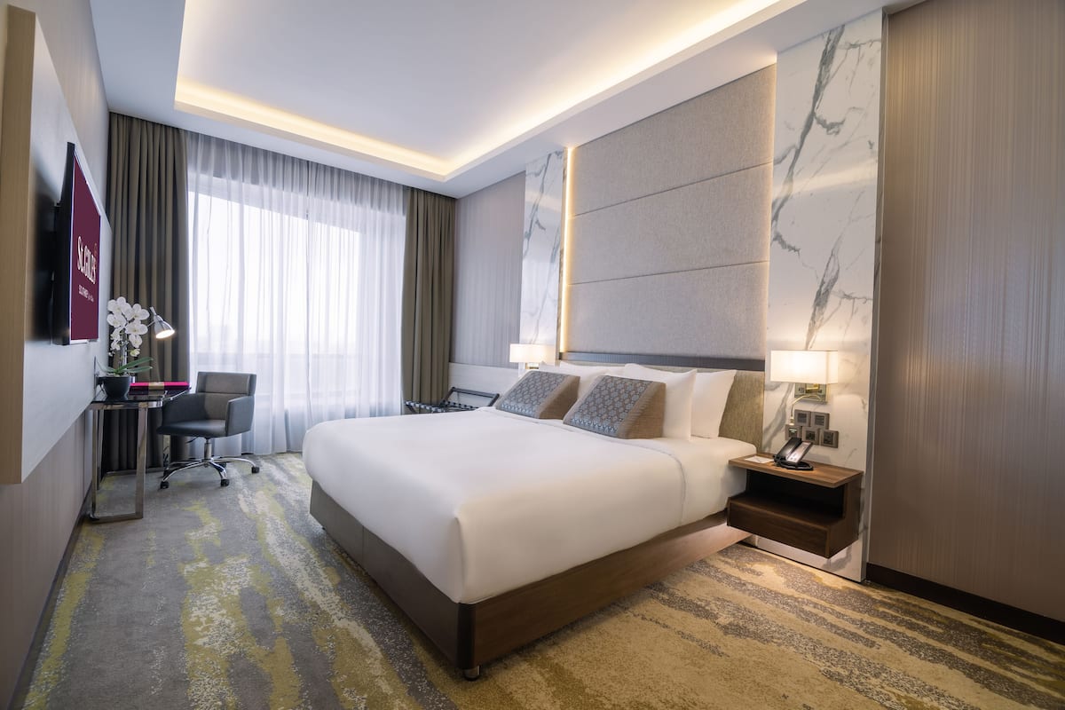 In-room safe, desk, laptop workspace, blackout curtains