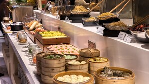 A buffet with various food items including meats, vegetables, and desserts. - St. Giles Southkey (Johor Bahru)