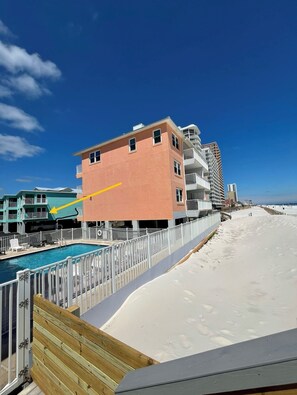 Outdoor pool, a heated pool - Harbor House 2BR 2BA Gulf-View 1st floor Wrap Balcony Pool King Bed (Gulf Shores)