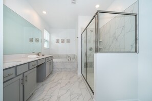 Bathtub, hair dryer, towels