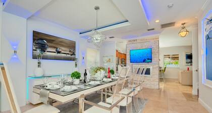 5 Mins to beach; 5BD, 4.5BA, Heated pool, Jacuzzi, Mini Golf, Tiki Huts.