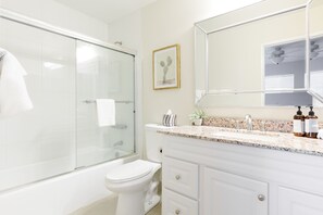 Combined shower/bathtub, hair dryer, towels, soap