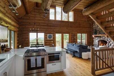 Watch the Snow Fall Over Lake Michigan from a Hot Tub at our Cabin in the Woods!