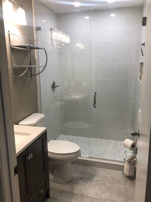 Shower, hair dryer, towels, soap