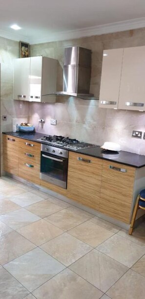 Fridge, microwave, oven, stovetop - Stay.Plus Parklands 4 Bedroom Apartment (Nairobi)