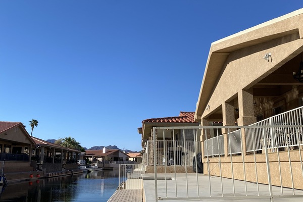 50 foot dock with large open patio for all your boating, sun & swimming needs .