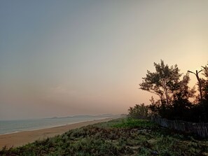 On the beach, sun-loungers, beach towels