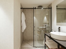 Interior apartment, 1 bedroom | Bathroom | Shower, rainfall showerhead, free toiletries, hair dryer