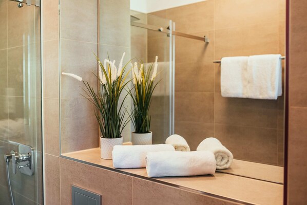 Shower, rainfall showerhead, hair dryer
