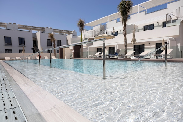 Outdoor pool, sun loungers