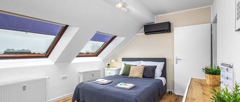 1 bedroom, desk, iron/ironing board, travel cot