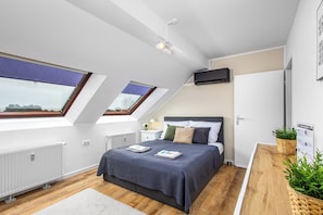 1 bedroom, desk, iron/ironing board, travel crib