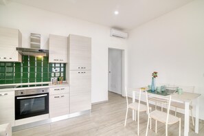 Family Apartment, Multiple Bedrooms, Sea Facing (Corallo House 200m From The Sea) | Private kitchen | Fridge, oven, stovetop, cookware/dishes/utensils