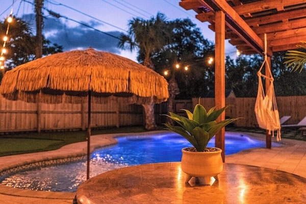 Our pool lights up the night for magical evenings outdoors. Dive into details & book for nighttime bliss!