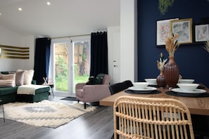 Apartamento | Área de estar | TV