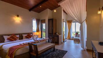 Premium Suite | Premium bedding, blackout curtains, iron/ironing board, free WiFi