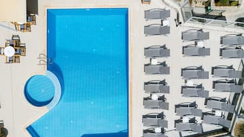Seasonal outdoor pool, pool umbrellas, pool loungers