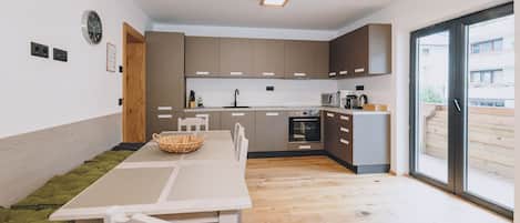Deluxe Condo | Private kitchen | Full-size fridge, oven, stovetop, dishwasher