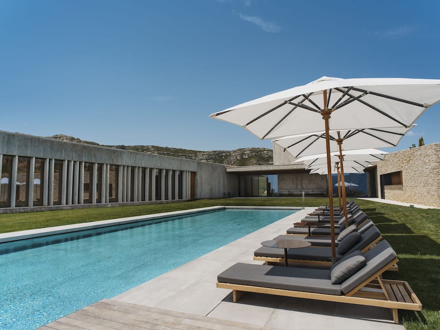 Indoor pool, seasonal outdoor pool, pool umbrellas, pool loungers
