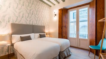 4 habitaciones, tabla de planchar con plancha, wifi y ropa de cama