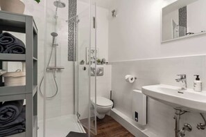 Shower, hair dryer, shampoo