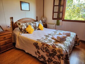 2 dormitorios, tabla de planchar con plancha, cuna de viaje y wifi