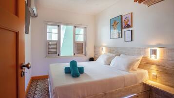 Design tweepersoonskamer, uitzicht op oceaan | Luxe beddengoed, een gratis minibar, een kluis op de kamer