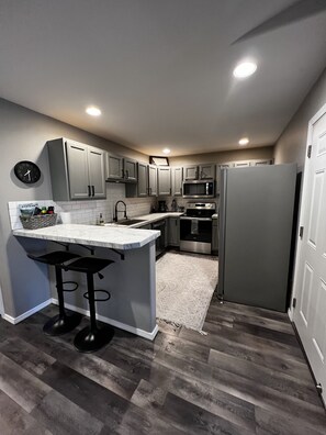 Fridge, microwave, oven, stovetop - Glacier Park Whitefish Getaway - Comfy & Updated (Columbia Falls)