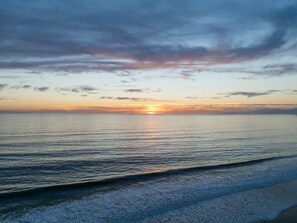 On the beach, sun-loungers, beach towels