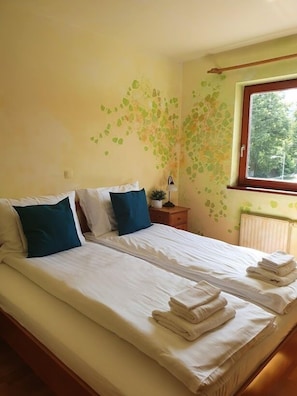 Desk, laptop workspace, blackout curtains, iron/ironing board