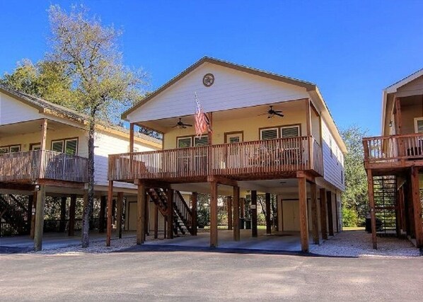 Front View of Guadalupe Getaway, notice the front porch and lower parking 
