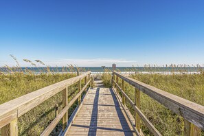 On the beach, sun loungers, beach towels
