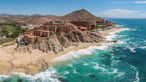 A coastal resort with multiple buildings, a beach, and ocean views. - The Westin Los Cabos Resort Villas - Baja Point (San José del Cabo)