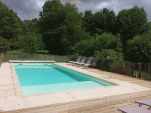 Alberca al aire libre y alberca climatizada