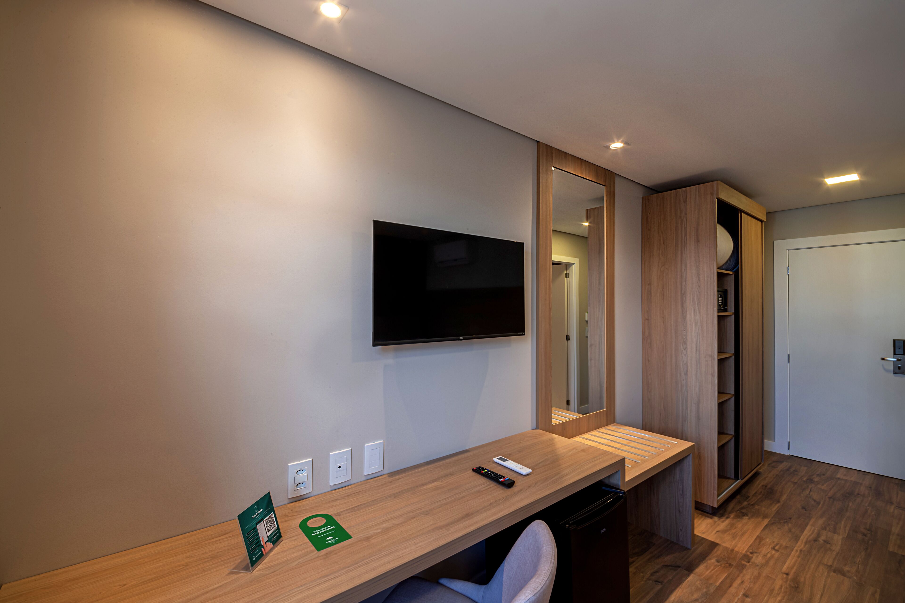 family room | 1 bedroom, minibar, in-room safe, desk